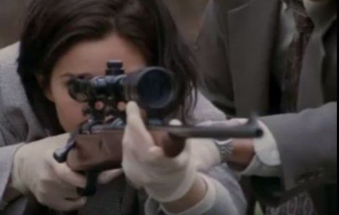 Carrie-Ann fires the sniper rifle
